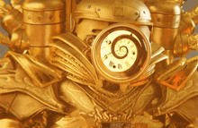 a close up of a gold statue with a clock on it that shows the time as 4:20