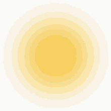 a yellow circle on a white background with a blurred effect .