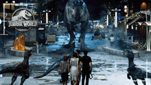 a group of people are standing in front of a jurassic world sign