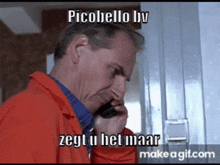 a man in a red jacket is talking on a cell phone and says picobello by zegt u het maar