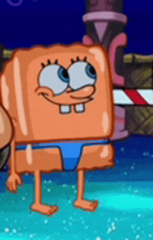 a spongebob squarepants character is standing in the water .