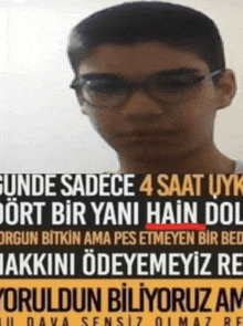 a young man wearing glasses and a sign that says ' sadece 4 saat uyk ' on it