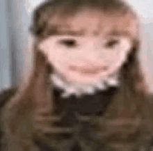 a blurry picture of a woman 's face with a smiley face .