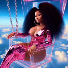 a woman in a pink bodysuit is sitting on a clear swing