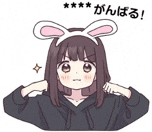 a girl wearing bunny ears and a black hoodie .