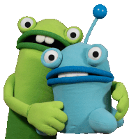 two stuffed frogs are hugging each other and one has a blue antenna on its head