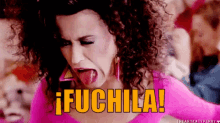 a woman with curly hair is sticking her tongue out and the words ifuchila are above her head