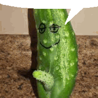 a pickle with a face drawn on it and a speech bubble above it