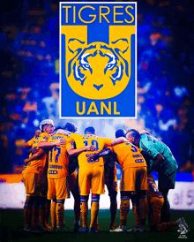 a group of soccer players are huddled together in front of a sign that says tigres uanl