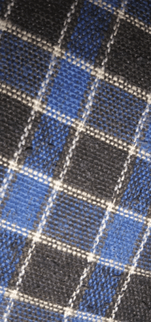 a close up of a blue and black plaid pattern