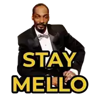 snoop dogg in a tuxedo with the words stay mello above him