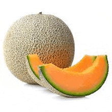 a cantaloupe with a slice taken out of it is on a white background .