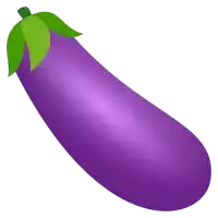 a purple eggplant with a green leaf on top of it