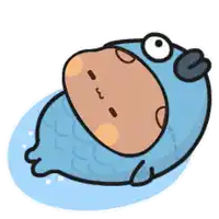 a cartoon character is wearing a fish costume and laying on the ground .