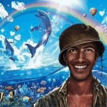 a man in a hat is smiling in front of a picture of dolphins and a rainbow .