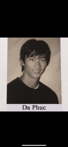 a black and white photo of a young man with the name da phục on the bottom