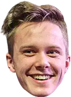 a close up of a young man 's face smiling with braces on his teeth .