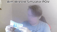 a man is holding a piece of paper with the words arm wrestle simulator pov written above him