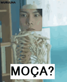 a picture of a man with a skeleton behind him and the words moca on the bottom