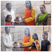 a man giving a book to a girl with a picture of a man on the cover