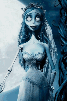 the corpse bride from tim burton 's the nightmare before christmas is holding a skeleton arm .