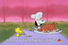 snoopy and woodstock are sitting at a table with a plate of food and a turkey on it .