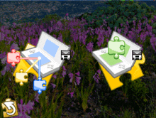 two laptops are sitting in a field of purple flowers and puzzle pieces