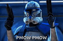 a star wars clone trooper is holding two guns in his hands .