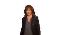 a woman with red hair wearing a black jacket