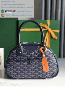 a goyard purse with a tag that says ' sherry.86urbanwear@msn.com ' on it