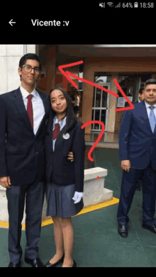 a man in a suit and tie is standing next to a girl in a school uniform with the words vicente on the bottom