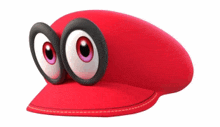 a red hat with cartoon eyes on it