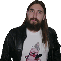 a man with long hair and a beard is wearing a t-shirt with a picture of a pig on it