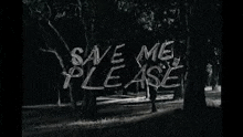 a black and white photo of a park with the words `` save me please '' written on the trees .