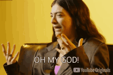 a woman in a suit says oh my god in front of a youtube originals logo