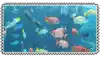 a group of fish are swimming in the ocean in a blurred image .