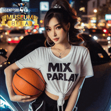 a woman holding a basketball wearing a shirt that says " mix parlay "