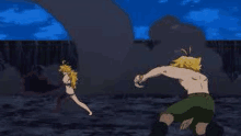 a man and a woman are fighting each other in a battle .