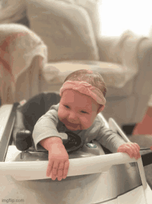 a baby in a walker with imgflip.com at the bottom of the image