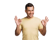 a man in a yellow t-shirt is giving an ok sign .