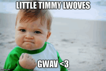 a baby with a fist in the air says little timmy lwowes gwav < 3