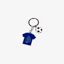 a blue shirt keychain with a soccer ball hanging from it