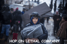 a boy holding a blanket with the words hop on lethal company written below him