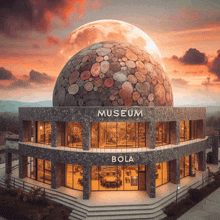 a building with a dome that says museum bola on it