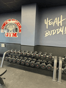 a gym with a sign that says yeah buddy on it