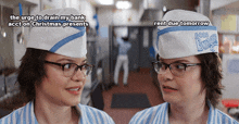 a woman wearing a good burger hat stands next to another woman