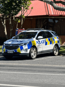 a police car is parked in a parking lot