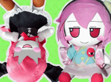 two stuffed dolls with pink hair and red eyes are sitting on a green background