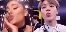 ariana grande and jimin of bts are making funny faces together .