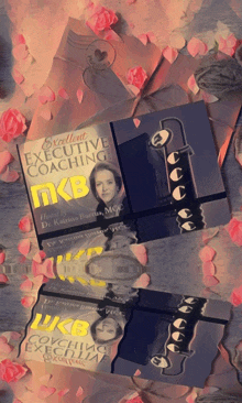 a book titled excellent executive coaching is surrounded by roses